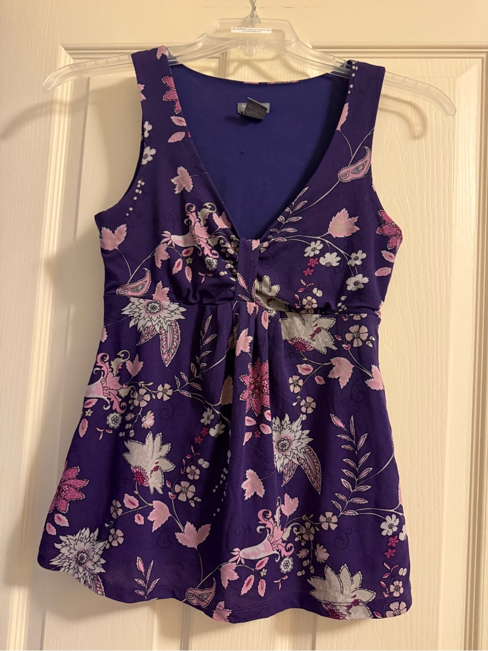 Sleeveless Purple Floral V-Neck Blouse with Empire Waist